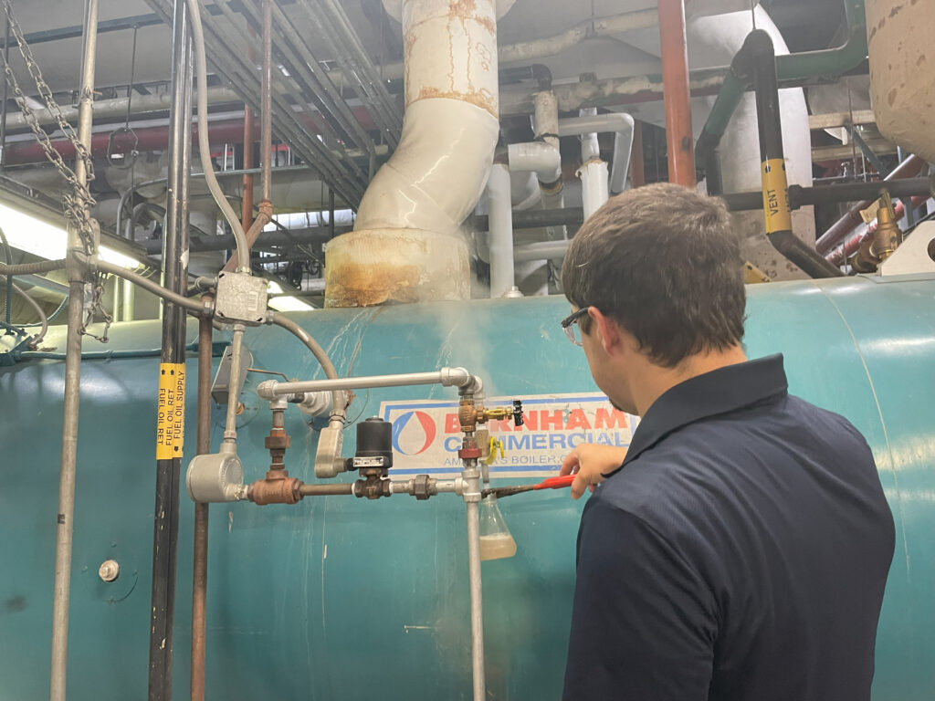 A service technician doing water treatment.