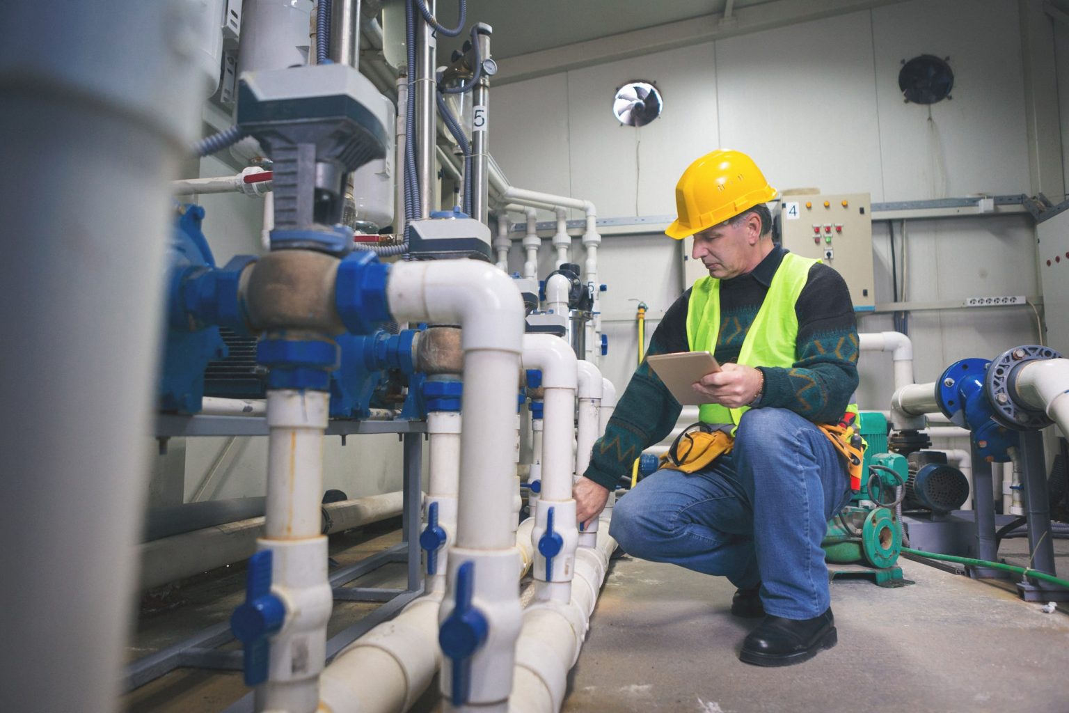 Man testing for corrosion in a closed loop system