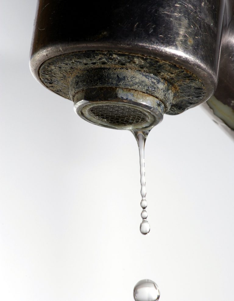 Scaling on a dripping water faucet